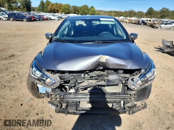 ✅ 2021 Nissan Versa SV • VIN: 3N1CN8EV6ML895703 • Lot: 91025765. Wystawiony na Copart z przebiegiem 60 318 mil. Bezpłatny archiwum sprzedaży aukcyjnych z USA i szczegółowy raport historii pojazdu na DreamBid. Zdjęcie 5.