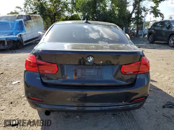 2018 BMW 3 Series 320i xDrive with VIN WBA8E5G57JNU46425, listed as a Copart auction lot 68207245 with 84,689 mi miles and Salvage title. Bid and sale history available at DreamBid. Image 6.
