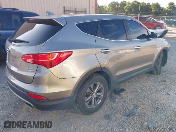 ✅ 2014 Hyundai Santa Fe • VIN: 5XYZTDLB3EG133890 • Лот: 42767468. Опубликован ранее на IAAI с пробегом 165 566 миль. Бесплатный доступ к архиву аукционных продаж из США и подробный отчёт об истории автомобиля на DreamBid. Изображение 4.
