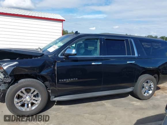 2018 Chevrolet Suburban LT z VIN 1GNSKHKC3JR146681, wystawiony jako IAAI lot #43394501 z przebiegiem 206 697 mil mil oraz . Historia ofert i sprzedaży dostępna na DreamBid. Obrazek 14.