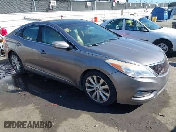 2013 Hyundai Azera с VIN KMHFH4JG9DA281474, выставлен на аукционе IAAI как лот 41881401 с пробегом 142 219 миль миль и . История ставок и продаж доступна на DreamBid. Изображение 1.