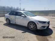 ✅ 2020 Buick Regal Avenir • VIN: W04GW6SX6L1009868 • Lot: 52039075. Listed on Copart with 70,756 mi. Free auction sales archive from the USA and detailed vehicle history report at DreamBid. Image 4.