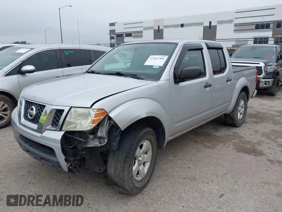 ✅ 2012 Nissan Frontier SV • VIN: 1N6AD0ER1CC450076 • Lot: 43107301. Listed on IAAI with 180,465 mi. Free auction sales archive from the USA and detailed vehicle history report at DreamBid. Image 2.