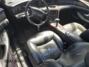 ✅ 1997 Lincoln Mark VIII • VIN: 1LNLM91V9VY726024 • Lot: 67572494. Listed on Copart with 107,338 mi. Free auction sales archive from the USA and detailed vehicle history report at DreamBid. Image 8.