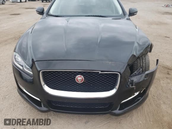 ✅ 2017 Jaguar XJ R-Sport • VIN: SAJWA1C73H8W10544 • Lot: 70025724. Listed on Copart with 64,437 mi. Free auction sales archive from the USA and detailed vehicle history report at DreamBid. Image 12.
