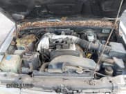 ✅ 2001 Kia Sportage • VIN: KNDJB723115706221 • Lot: 41562713. Wystawiony na IAAI z przebiegiem 99 378 mil. Bezpłatny archiwum sprzedaży aukcyjnych z USA i szczegółowy raport historii pojazdu na DreamBid. Zdjęcie 10.