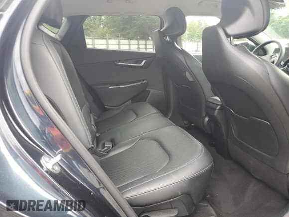 ✅ 2023 Kia EV6 Wind • VIN: KNDC34LA6P5610126 • Lot: 71825534. Wystawiony na Copart z przebiegiem 55 662 mil. Bezpłatny archiwum sprzedaży aukcyjnych z USA i szczegółowy raport historii pojazdu na DreamBid. Zdjęcie 10.