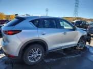 ✅ 2020 Mazda CX-5 Touring • VIN: JM3KFBCM8L1810080 • Lot: 90259945. Wystawiony na Copart z przebiegiem 57 139 mil. Bezpłatny archiwum sprzedaży aukcyjnych z USA i szczegółowy raport historii pojazdu na DreamBid. Zdjęcie 3.