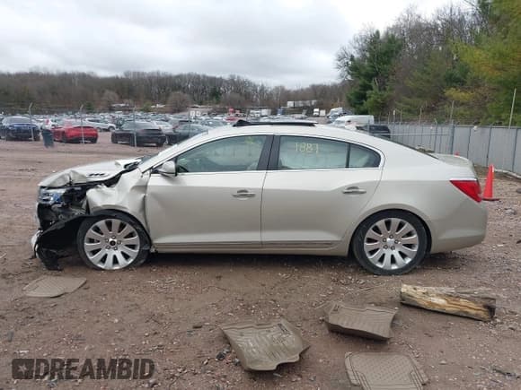 ✅ 2014 Buick LaCrosse Premium I • VIN: 1G4GE5G31EF293100 • Лот: 42081887. Опубликован ранее на IAAI с пробегом 147 191 миль. Бесплатный доступ к архиву аукционных продаж из США и подробный отчёт об истории автомобиля на DreamBid. Изображение 13.