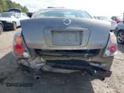 ✅ 2003 Nissan Altima SE • VIN: 1N4BL11DX3C331331 • Lot: 41908824. Listed on IAAI with 115,026 mi. Free auction sales archive from the USA and detailed vehicle history report at DreamBid. Image 6.