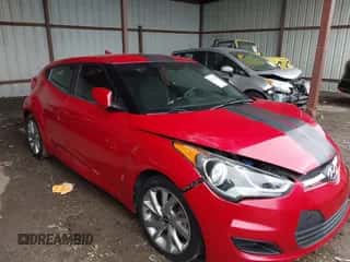 2016 Hyundai Veloster z VIN KMHTC6AD1GU272922, wystawiony jako IAAI lot #43115743 z przebiegiem 85 156 mil mil oraz . Historia ofert i sprzedaży dostępna na DreamBid. Obrazek 1.