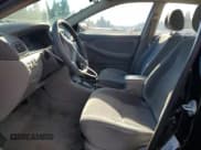 ✅ 2003 Toyota Corolla CE • VIN: JTDBR32E732011465 • Lot: 93762125. Listed on Copart with 189,871 mi. Free auction sales archive from the USA and detailed vehicle history report at DreamBid. Image 7.