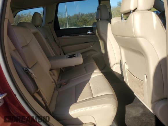 ✅ 2014 Jeep Grand Cherokee Limited • VIN: 1C4RJFBM7EC521634 • Лот: 91701005. Опубликован ранее на Copart с пробегом 120 620 миль. Бесплатный доступ к архиву аукционных продаж из США и подробный отчёт об истории автомобиля на DreamBid. Изображение 11.