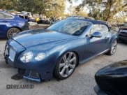 ✅ 2013 Bentley Continental GT • VIN: SCBGR3ZA0DC079677 • Lot: 82753764. Listed on Copart with 58,406 mi. Free auction sales archive from the USA and detailed vehicle history report at DreamBid. Image 1.