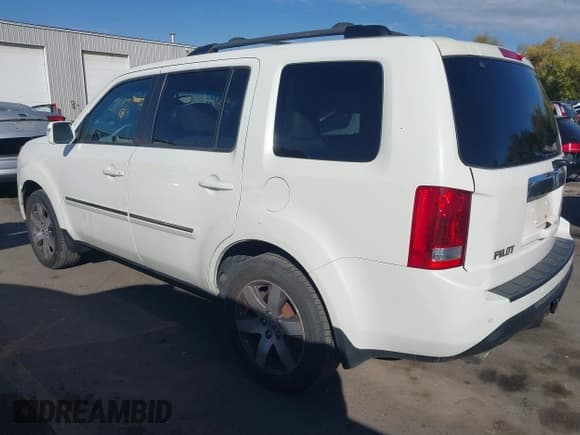 ✅ 2013 Honda Pilot Touring • VIN: 5FNYF4H90DB001880 • Lot: 43519244. Listed on IAAI with 199,875 mi. Free auction sales archive from the USA and detailed vehicle history report at DreamBid. Image 3.
