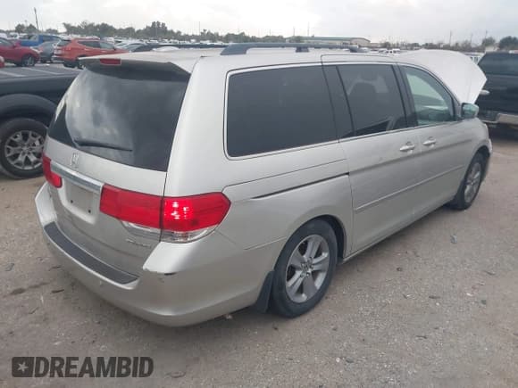✅ 2008 Honda Odyssey Touring • VIN: 5FNRL38938B054926 • Lot: 43786904. Listed on IAAI with 147,117 mi. Free auction sales archive from the USA and detailed vehicle history report at DreamBid. Image 4.