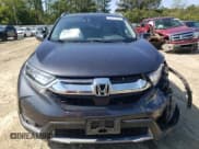 ✅ 2017 Honda CR-V Touring • VIN: 2HKRW2H93HH669219 • Lot: 81371095. Wystawiony na Copart z przebiegiem 129 789 mil. Bezpłatny archiwum sprzedaży aukcyjnych z USA i szczegółowy raport historii pojazdu na DreamBid. Zdjęcie 5.