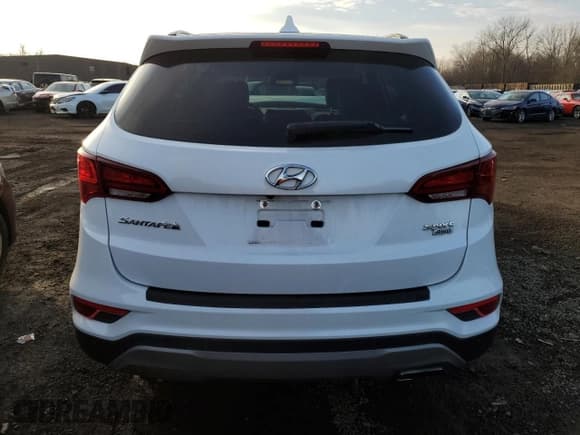 ✅ 2018 Hyundai Santa Fe 2.4L • VIN: 5NMZUDLB5JH078629 • Лот: 79130733. Опубликован ранее на Copart с пробегом 105 511 миль. Бесплатный доступ к архиву аукционных продаж из США и подробный отчёт об истории автомобиля на DreamBid. Изображение 6.