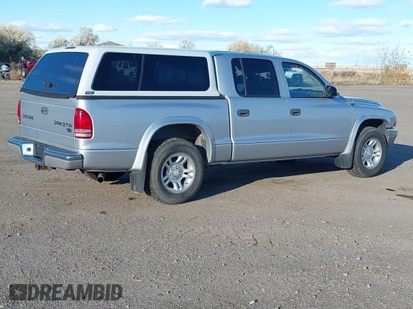✅ 2004 Dodge Dakota SLT • VIN: 1D7HL48NX4S690941 • Lot: 43535915. Listed on IAAI with 133,394 mi. Free auction sales archive from the USA and detailed vehicle history report at DreamBid. Image 4.