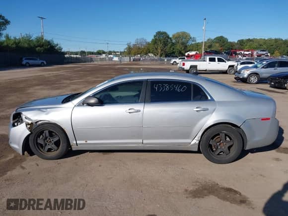 2012 Chevrolet Malibu 1LS with VIN 1G1ZB5E05CF240002, listed as a IAAI auction lot 43385460 with 151,059 mi miles and . Bid and sale history available at DreamBid. Image 14.