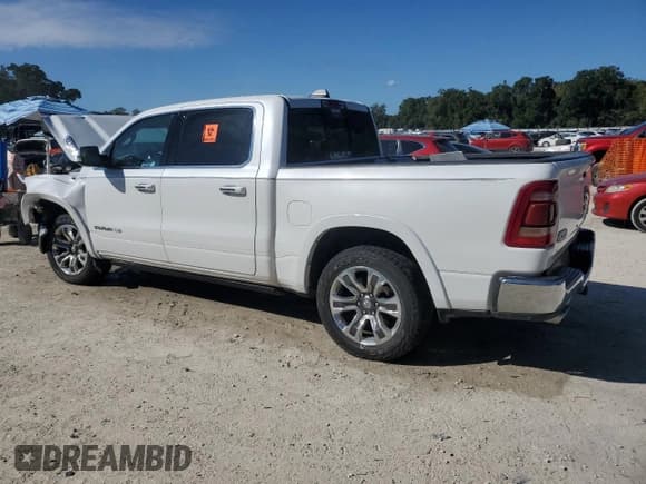 ✅ 2021 Ram 1500 Longhorn • VIN: 1C6SRFKTXMN633632 • Lot: 87084985. Listed on Copart with Not provided. Free auction sales archive from the USA and detailed vehicle history report at DreamBid. Image 2.