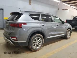 ✅ 2019 Hyundai Santa Fe SE • VIN: 5NMS2CAD7KH091423 • Lot: 65404314. Wystawiony na Copart z przebiegiem 68 431 mil. Bezpłatny archiwum sprzedaży aukcyjnych z USA i szczegółowy raport historii pojazdu na DreamBid. Zdjęcie 3.