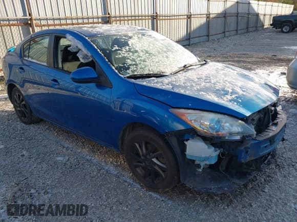 ✅ 2012 Mazda 3 i Touring • VIN: JM1BL1V71C1625940 • Lot: 43659745. Listed on IAAI with 134,863 mi. Free auction sales archive from the USA and detailed vehicle history report at DreamBid. Image 1.