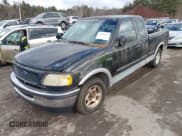 ✅ 1997 Ford F-150 • VIN: 2FTEX17L6VCA98345 • Lot: 41249037. Listed on IAAI with 241,606 mi. Free auction sales archive from the USA and detailed vehicle history report at DreamBid. Image 6.
