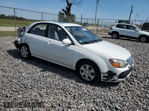 ✅ 2009 Kia Spectra EX • VIN: KNAFE221595597074 • Lot: 71874735. Listed on Copart with 204,954 mi. Free auction sales archive from the USA and detailed vehicle history report at DreamBid. Image 4.