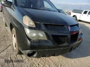 ✅ 2002 Pontiac Aztek • VIN: 3G7DA03E12S582738 • Лот: 53028495. Опубликован ранее на Copart с пробегом 153 228 миль. Бесплатный доступ к архиву аукционных продаж из США и подробный отчёт об истории автомобиля на DreamBid. Изображение 14.