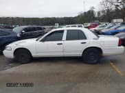 ✅ 2005 Ford Police Interceptor • VIN: 2FAFP71W75X120703 • Lot: 41256222. Listed on IAAI with 208,095 mi. Free auction sales archive from the USA and detailed vehicle history report at DreamBid. Image 14.