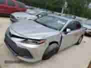 2021 Toyota Camry Hybrid LE with VIN 4T1C31AK7MU562031, listed as a Copart auction lot 71506375 with 82,877 mi miles and Salvage title. Bid and sale history available at DreamBid. Image 1.