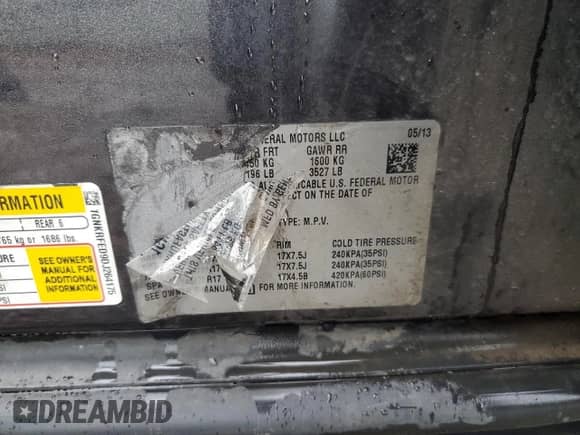 2013 Chevrolet Traverse LS with VIN 1GNKRFED9DJ264175, listed as a Copart auction lot 70766185 with 108,535 mi miles and Salvage title. Bid and sale history available at DreamBid. Image 13.