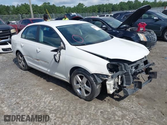 ✅ 2009 Volkswagen Jetta S • VIN: 3VWJZ71K29M123468 • Lot: 42885528. Listed on IAAI with 167,589 mi. Free auction sales archive from the USA and detailed vehicle history report at DreamBid. Image 1.