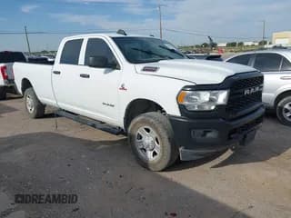 ✅ 2022 Ram 2500 Tradesman • VIN: 3C6UR5HL4NG281880 • Lot: 42893606. Listed on IAAI with 47,021 mi. Free auction sales archive from the USA and detailed vehicle history report at DreamBid. Image 1.