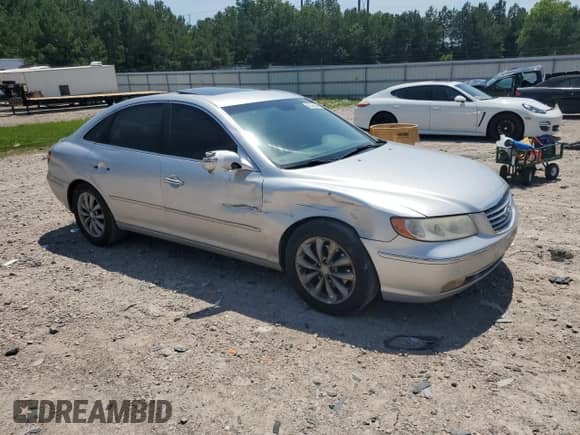 2008 Hyundai Azera Limited с VIN KMHFC46F98A303977, выставлен на аукционе Copart как лот 62328645 с пробегом 220 663 миль миль и Списание • Salvage title. История ставок и продаж доступна на DreamBid. Изображение 4.