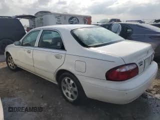 ✅ 2000 Mazda 626 LX • VIN: 1YVGF22C3Y5102174 • Lot: 75287594. Wystawiony na Copart z przebiegiem Nie podano. Bezpłatny archiwum sprzedaży aukcyjnych z USA i szczegółowy raport historii pojazdu na DreamBid. Zdjęcie 2.