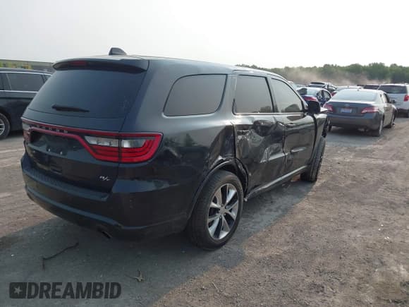 ✅ 2014 Dodge Durango R/T • VIN: 1C4SDHCT4EC513789 • Lot: 42389059. Listed on IAAI with 151,506 mi. Free auction sales archive from the USA and detailed vehicle history report at DreamBid. Image 4.