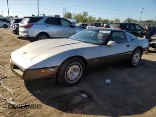 1986 Chevrolet Corvette with VIN 1G1YY0789G5111997, listed as a Copart auction lot 84414155 with 64,511 mi miles and Clean title. Bid and sale history available at DreamBid. Image 1.