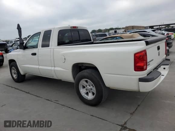 2008 Dodge Dakota SLT с VIN 1D7HE42K88S638304, выставлен на аукционе Copart как лот 51587294 с пробегом 120 295 миль миль и Чистый • Clean title. История ставок и продаж доступна на DreamBid. Изображение 2.
