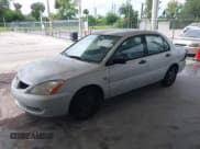 ✅ 2004 Mitsubishi Lancer ES • VIN: JA3AJ26E84U024382 • Лот: 43135165. Опубликован ранее на IAAI с пробегом 205 764 миль. Бесплатный доступ к архиву аукционных продаж из США и подробный отчёт об истории автомобиля на DreamBid. Изображение 2.
