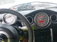 ✅ 2003 MINI Hardtop S • VIN: WMWRE33423TD59989 • Lot: 43833635. Wystawiony na IAAI z przebiegiem 99 923 mil. Bezpłatny archiwum sprzedaży aukcyjnych z USA i szczegółowy raport historii pojazdu na DreamBid. Zdjęcie 7.