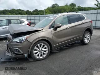 ✅ 2016 Buick Envision Premium I • VIN: LRBFXESX9GD170923 • Lot: 66548935. Listed on Copart with 127,523 mi. Free auction sales archive from the USA and detailed vehicle history report at DreamBid. Image 1.