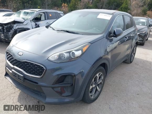 ✅ 2020 Kia Sportage LX • VIN: KNDPM3AC6L7635023 • Lot: 43748619. Listed on IAAI with 102,089 mi. Free auction sales archive from the USA and detailed vehicle history report at DreamBid. Image 2.