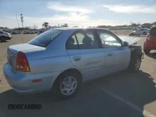 2003 Hyundai Accent GL с VIN KMHCG45C23U428132, выставлен на аукционе Copart как лот 45493875 с пробегом Не указан миль и Списание • Salvage title. История ставок и продаж доступна на DreamBid. Изображение 3.