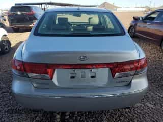 2007 Hyundai Azera SE z VIN KMHFC46F57A205043, wystawiony jako Copart lot #49531885 z przebiegiem 107 272 mil mil oraz Czysty tytuł • Clean title. Historia ofert i sprzedaży dostępna na DreamBid. Obrazek 6.