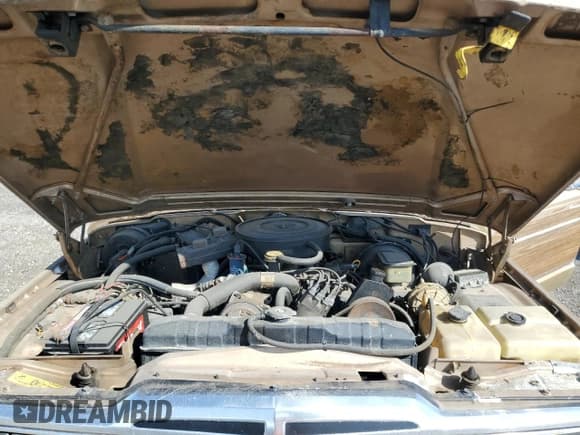 ✅ 1990 Jeep Grand Wagoneer • VIN: 1J4GS5875LP504606 • Lot: 65137765. Listed on Copart with 204,729 mi. Free auction sales archive from the USA and detailed vehicle history report at DreamBid. Image 12.