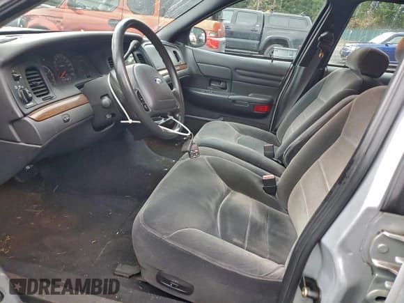 ✅ 2001 Ford Crown Victoria LX • VIN: 2FAFP74W51X165564 • Лот: 94812385. Опубликован ранее на Copart с пробегом 156 893 миль. Бесплатный доступ к архиву аукционных продаж из США и подробный отчёт об истории автомобиля на DreamBid. Изображение 7.