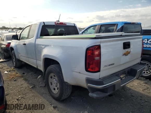 ✅ 2019 Chevrolet Colorado 2WD Work Truck • VIN: 1GCHSBEA6K1212974 • Лот: 76504324. Опубликован ранее на Copart с пробегом 92 091 миль. Бесплатный доступ к архиву аукционных продаж из США и подробный отчёт об истории автомобиля на DreamBid. Изображение 2.