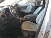 ✅ 2018 Chevrolet Equinox LS • VIN: 2GNAXHEV6J6211092 • Lot: 82217175. Listed on Copart with 65,334 mi. Free auction sales archive from the USA and detailed vehicle history report at DreamBid. Image 7.